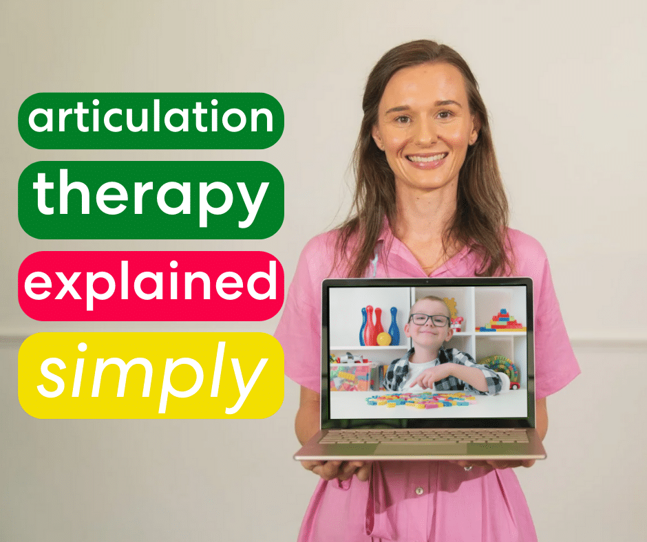 Smiling speech therapist holding a laptop that's showing a video call with a young boy. The text "articulation therapy explained simply" is overlaid on the left side in colourful blocks. The therapist is wearing a pink dress, and the boy on the screen is smiling and wearing glasses, sitting at a table with colourful toys.